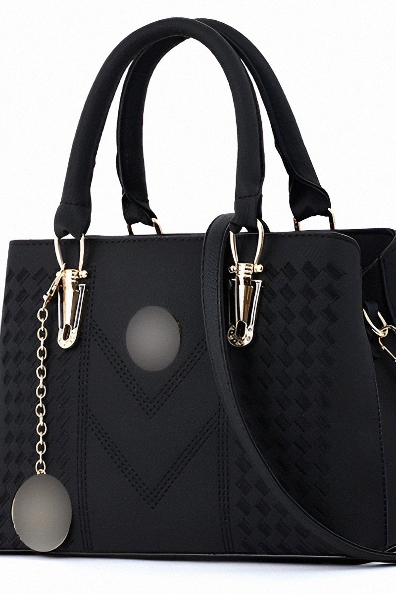 Sac à main marron à motifs géométriques