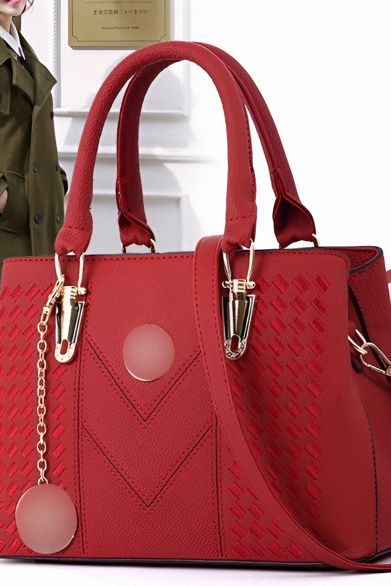 Sac à main marron à motifs géométriques