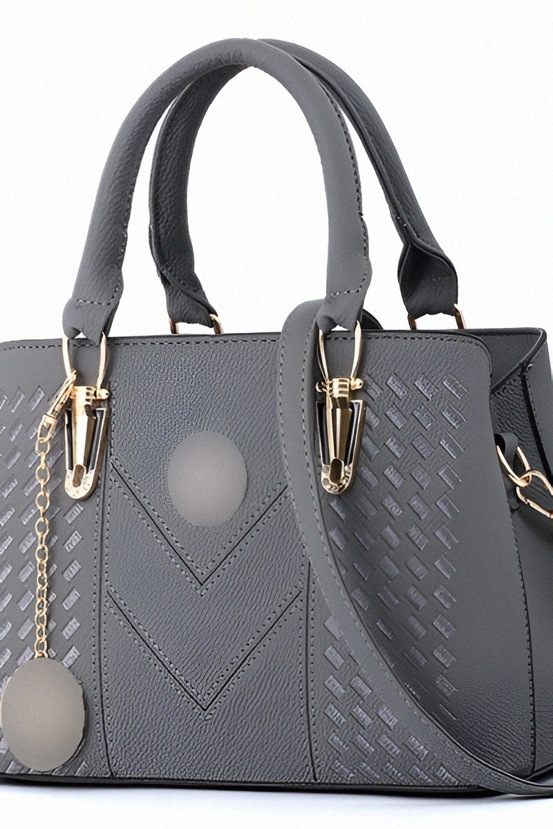 Sac à main marron à motifs géométriques