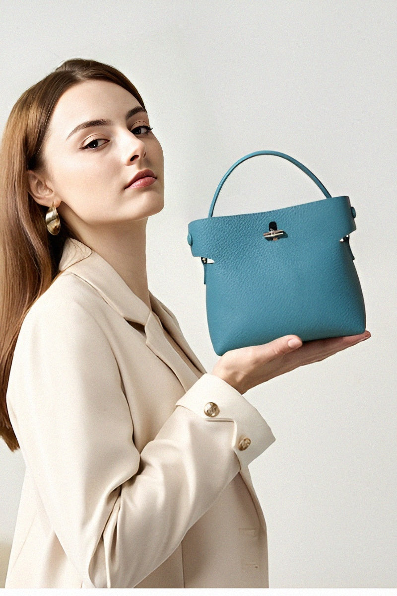 Mini sac à main bleu turquoise en cuir grainé